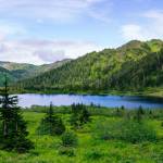 A view of Cropley Lake, from one of the streams feeding into it, on Sunday, June 24, 2018. (Gabe Donohoe | For the Juneau Empire)