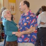Tineke VanGelder dances during the annual pre-fireworks Barn Dance at St. Anns Parish Hall Tuesday, July 3. (Gregory Philson | Juneau Empire)