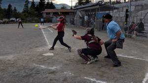 Gastineau Channel Little Leagues Gloria Bixby makes contact in the bottom of the fifth inning of Game five of the Alaska District Two Junior Softball Tournament. Bixby recorded a single and scored twice in a 9-6 win. (Spencer Gleason | Ketchikan Daily News)