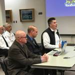 Fitch and Associates members Steve Knight and BJ Jungman make a presentation along with Capital City and Fire Rescue Fire Chief Steve Etheridge during the City and Borough of Juneau Committee of the Whole meeting Wednesday. (Gregory Philson| Juneau Empire)