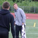 Western Oregon University quarterback Ty Currie tosses the ball to a camper during the Football Skills, Strength and Speed Camp at Thunder Mountain High School on Wednesday. Currie is one of three active WOU players helping to staff the camp this week. (Nolin Ainsworth | Juneau Empire)