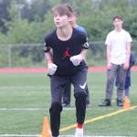 Terry Wilson, 14, executes a speed drill at the Football Skills, Strength and Speed Camp at Thunder Mountain High School on Wednesday. (Nolin Ainsworth | Juneau Empire)