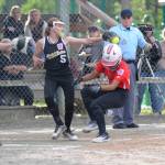 Gastineau Channel Little Leagues Remi Starks steals home under the glove of Abbott-O-Rabbit Little Leagues Alexis Moore in the top of the fourth inning of the Alaska Major Softball State Championships at Melvin Park on Thursday. GCLL (Juneau) won 16-13. (Nolin Ainsworth | Juneau Empire)
