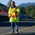 Richard Dick Goto runs down Riverside Drive in the Mendenhall Valley on Friday. (Nolin Ainsworth | Juneau Empire)