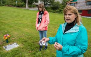 Paula Haug, of Folsom, California, and her daughter, Carlie, visit the grave of Haugs great-grandmother Soyla Valentina Cardwell Lockhart on Tuesday, July 17, 2018. Cardwell died in Juneau in 1918. With the help of the folks at Evergreen Cemetery, she was able to track down where Lockhart was buried and place a stone on her previously unmarked grave. (Michael Penn | Juneau Empire)