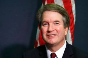 Supreme Court nominee Brett Kavanaugh glances at reporters during a meeting with Sen. James Lankford, R-Okla., on Capitol Hill in Washington, Thursday, July 19, 2018. (Manuel Balce Ceneta | The Associated Press)
