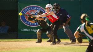 Chloe Casperson lays down a bunt against Pendleton, Oregon, in the Little League West Region Softball Tournament at Al Houghton Stadium in San Bernardino, California, on Wednesday. (Courtesy Photo | Gabe Strong)