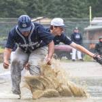 Juneau Post 25 first baseman Olin Rawson and Eagle Rivers Orazio Ramos in Juneaus final home game of the season on Sunday, July 15, 2018, at Adair-Kennedy Memorial Park. (Courtesy Photo | Heather Holt)