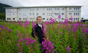 In this Aug. 9, 2012 photo, Dan Austin, general manager of St Vincent de Paul, stands on property across from Smith Hall. (Michael Penn | Juneau Empire File)