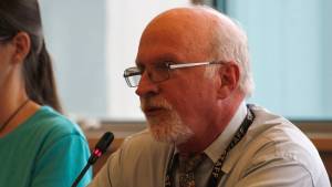 Juneau School District Superintendent Mark Miller speaks during a Board of Education meeting on Friday, July 27, 2018. The board unanimously voted to release Miller from his contract after he submitted his resignation Wednesday. (Alex McCarthy | Juneau Empire)