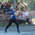 Thunder Mountain's Lonnie Echiverri looks up at a fly ball she hit to left field against Juneau-Douglas High School on Saturday. TMHS won 7-4.