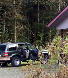 Police are seen searching a vehicle found abandoned in a driveway on Mountain Avenue after a police chase Thursday morning, in this photograph submitted to the Empire by a witness to the chase.