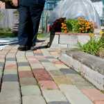 Alan Love made over 1000 colored bricks to decorate his backyard garden in the Mendenhall Valley.