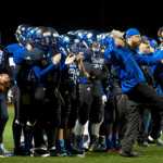 Thunder Mountain's coaching staff and players celebrate a touchdown during their game against Ketchikan High School on Friday.