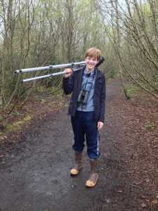 Owen Squires, 14, gets ready to bird. Squires and his mother, Marsha Squires, were the first to sight and ID a male hooded oriole in Juneau that has inspired birders to visit from as far as Fairbanks.
