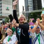 Colleen Feldmann, of Fallsington, Pennsylvania, center, and Sister Donna with Missionaries of Charity in India, right, cheer as Pope Francis arrives at the Cathedral Basilica of Saints Peter and Paul on Saturday in Philadelphia.