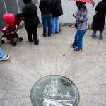 People gather for the Blessing of the Fleet in front of the Alaska Commercial Fishermen's Memorial in May 2012.