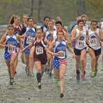 The 4A girls run at the start of the Region V championships on Saturday at Sandy Beach.