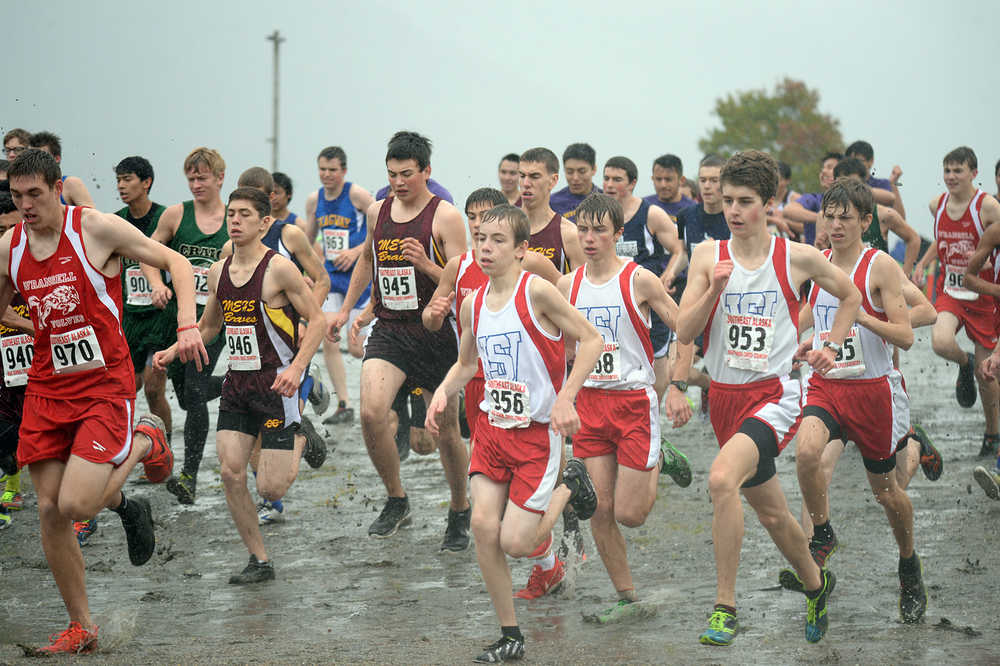 The 1A/2A/3A boys run at the start of the Region V championships on Saturday at Sandy Beach.