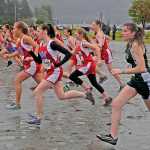The 1A/2A/3A girls run at the start of the Region V championships on Saturday at Sandy Beach.