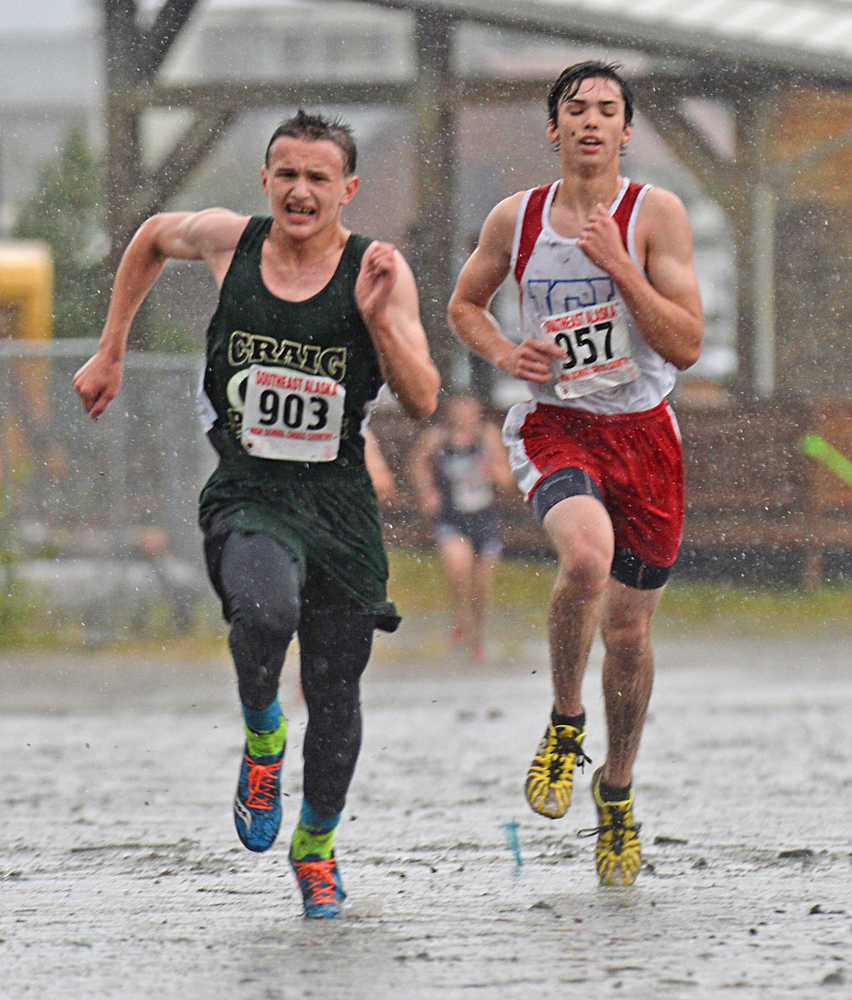 Craig's Andrew Marker and Sitka's Triston Rosas race to the finish of the boys 1A/2A/3A Region V championships on Saturday at Sandy Beach.