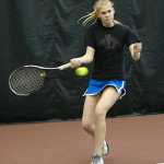 Juneau-Douglas High School junior Sami Good hits a forehand during the Region V tennis tournament at the JRC/The Alaska Club Valley on Thursday. Play continues today from 11:30 a.m. to 2:30 p.m. The boys singles semi-finals is scheduled for 11:30 a.m. and the final at 1 p.m. The girls singles championship is scheduled for 1 p.m. The mixed doubles final is scheduled for 2:30 p.m.