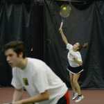 Juneau-Douglas High School freshman Erica Hurtte serves during the Region V tennis tournament at the JRC/The Alaska Club Valley on Thursday. Play continues today from 11:30 a.m. to 2:30 p.m.