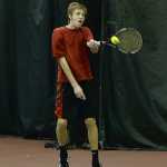 Juneau-Douglas High School sophomore Kolby Hoover hits a backhand during the Region V tennis tournament at the JRC/The Alaska Club Valley on Thursday. Play continues today from 11:30 a.m. to 2:30 p.m.