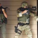 Authorities respond to a report of a shooting at Umpqua Community College on Thursday in Roseburg, Oregon.