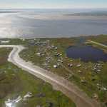 The village of Newtok in western Alaska is viewed on Aug. 4. The state is hoping to kick-start a mass exodus from the tiny village through a national competition for states and local governments vying for a slice of nearly $1 billion in grants to be awarded by the U.S. Department of Housing and Urban Development.