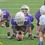 Vikings' quarterback Bubba Burras (9) sets to take the snap from Andrew Royston (62) during JYFL Cub Division playoff action on Saturday at Adair Kennedy Field. The Vikings defeated the Cowboys 21-18 and will play the Seahawks for the championship next Saturday at 9 a.m. on Adair. A slideshow of photos is online at juneauempire.com.
