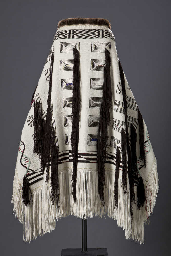 This Ravenstail robe is the first all mountain robe in more than 200 years. The double helix along its side is for mountain goat DNA, and indicates how Baranof's goats are different.