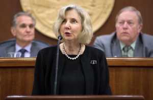In this file photo, Alaska Supreme Court Justice Dana Fabe gives the State of the Judiciary address to a joint session of the Alaska Legislature on Feb. 11 as Senate President Kevin Meyer, R-Anchorage, left, and Speaker of the House Mike Chenault, R-Nikiski, listen.