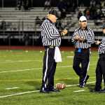 Football officials (left-to-right) Karen Lawfer, Bob Thompson, Bob Sims, Jason Boyle and Nathan Bartee work the Thunder Mountain game against Soldotna in 2013 at TMHS Field. Always in the spotlight referees, officials and umpires are the first to be blamed and the last to be thanked in sporting events. Without their dedication, local sports would be at a loss.