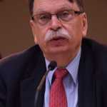 Brian Rogers, a candidate to become director of the Alaska Permanent Fund Corporation, answers questions from the corporation's board of trustees on Wednesday, Oct. 7, 2015 in Juneau.