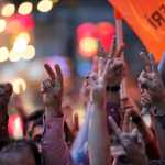 Demonstrators flash the V-sign during a rally in central Istanbul to protest the bombing in Ankara earlier Saturday. Thousands of protestors flooded the main street in central Istanbul shouting slogans condemning the twin bombings that killed dozens of people in nation¹s capital. The two bomb explosions targeted a peace rally, that was aimed to call for an end to the renewed violence between Kurdish rebels and Turkish security forces.