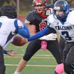 Juneau-Douglas High School senior Hunter Hickok, shown in action against the Thunder Mountain Falcons this season, was selected the Southeast Conference Defensive Player of the Year on Wednesday.