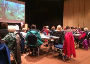 Attendees at Cancer Connection's health forum listen to Dr. Astrid Pujari as she discusses the health relationship between mind and body.