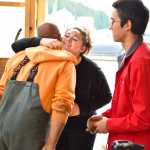 After the interview, Hill and the students exchange hugs and smoked salmon.