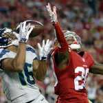 Seattle Seahawks wide receiver Tyler Lockett (16) catches a touchdown pass in front of San Francisco 49ers cornerback Tramaine Brock (26) during the first half of an NFL football game in Santa Clara, Calif., Thursday, Oct. 22, 2015. (AP Photo/Marcio Jose Sanchez)