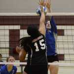 Juneau-Douglas' Soana Kelepi (15) and Thunder Mountain's Makayla Harp go for a ball during the All Comers Volleyball Tournament at Juneau-Douglas on Saturday. A slideshow of photos is online at juneauempire.com.