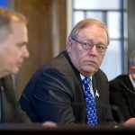 Rep. Mark Neuman, R-Big Lake, left, Speaker of the House Mike Chenault, R-Nikiski, and Steve Thompson, R-Fairbanks, right, speak to media members at the Capitol after the start of the 3rd Special Session of the legislature this year on Saturday.