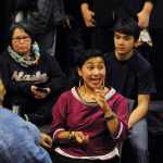 In this photo taken on Oct. 13, Marjorie Tahbone of Nome gives a skin sewing tattoo demonstration during the First Alaskans Institute Elders and Youth Conference in Anchorage.