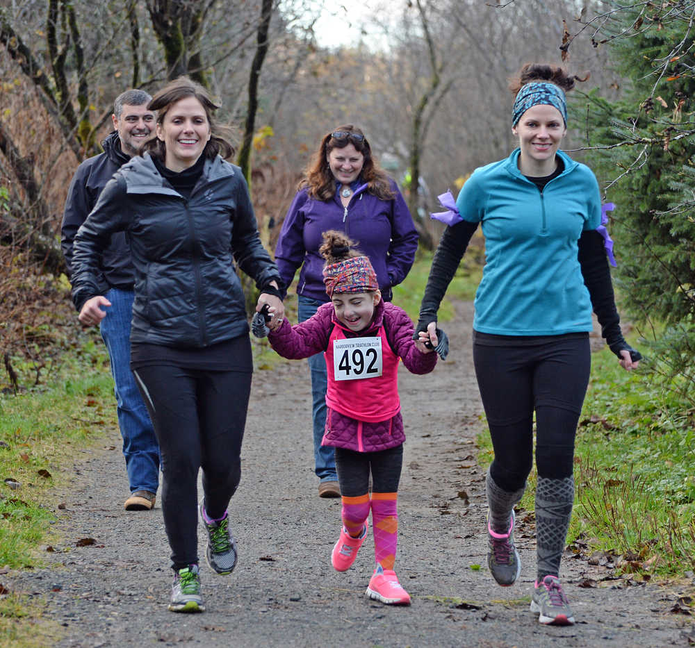 Runners begin their journey through zombie-infected trails during Sunday's 4th Annual Zombie Run 5K or 1-mile run on the Treadwell Trails at Sandy Beach. The event was a fundraiser for the Harborview Elementary Triathlon Club.