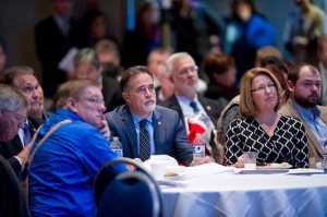 Legislators listen to Attorney General Craig Richards announce on Wednesday a proposal by the Walker administration to redirect almost all of the state's oil revenue to the Permanent Fund. The briefing took place at Centennial Hall for legislators and their staffs.