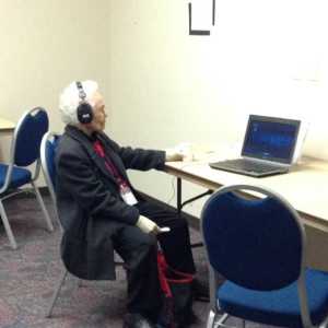 Tlingit elder Marie Olson listens to recordings gathered as part of the Juneau LIbrary's ongoing Story Corps project, which focuses us Alaska Native experiences.