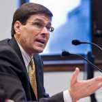 Steve Butt, senior project manager of the ExxonMobil Development Company and currently serving as the project manager for the Alaska LNG Project, testifies in front of the Senate Finance Committee at the Capitol on Friday.