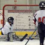 The Juneau Douglas Ice Association youth hockey Juneau Capitals Squirts teams, born in 2005-2006, battle on the ice on Halloween Saturday at the Treadwell Ice Arena.