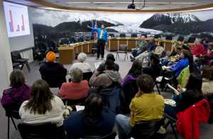 Brian Wilson, a research analyst for the Alaska Mental Health Board, speaks to Juneau residents attending a lunch meeting on the city's homeless vulnerability index in the Assembly chambers on Monday.