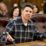 Mark Morris speaks in favor of the TransCanada buyout proposal during public testimony in the House Finance Committee at the Capitol on Monday.